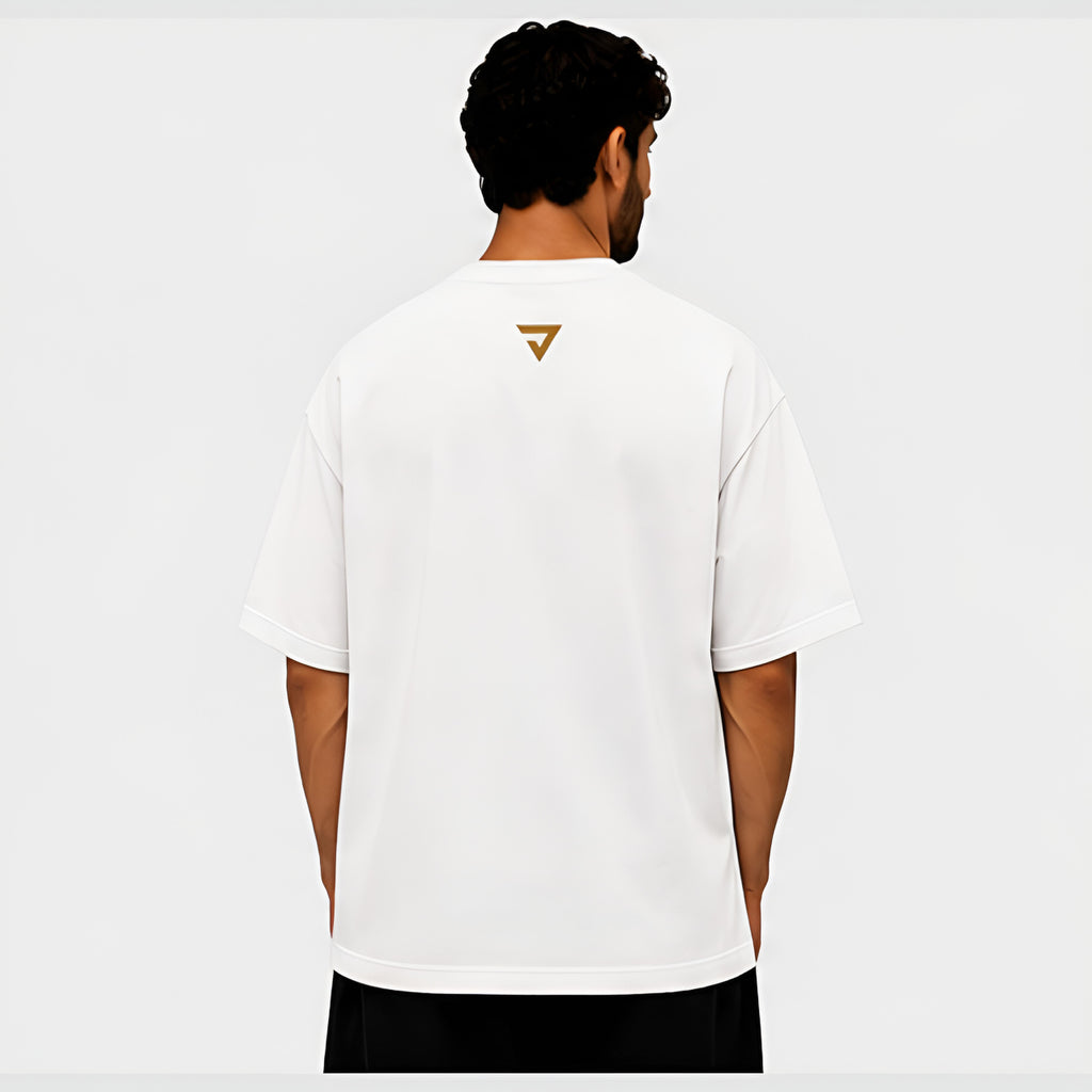 Essential Oversized Tee - Back view, EINZEK gold triangle logo on white